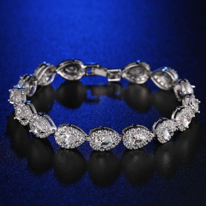 Elegant pear-cut cubic zirconia halo bracelet in silver finish for weddings