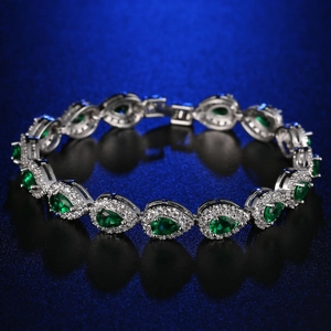Silver bracelet featuring green pear-cut stones and AAA zircon micro-paving accents
