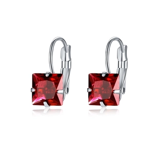 Detailed macro view of square cut red zircon earrings with silver lever-back hooks