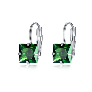 Macro shot of silver leverback earrings featuring square-cut emerald green zircon stones