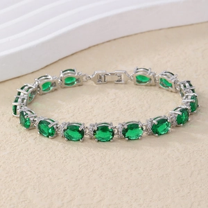 Detail showing S925 sterling silver clasp and green oval crystal gemstone tennis bracelet