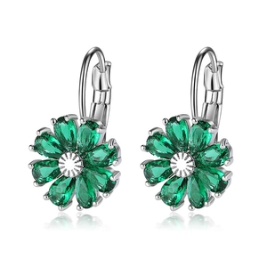 Detailed close-up of crystal flower drop earrings with vibrant green zircon petals