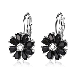 Detail view of flower lever-back earrings with black teardrop stones and silver center