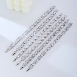 Geometric silver bracelet set with sparkling cubic zirconia crystals in diverse stone cuts