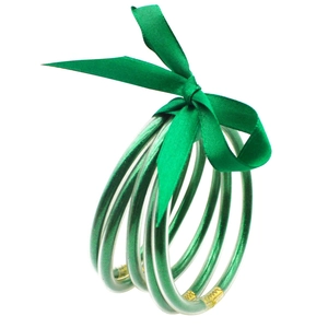 Set de 5 pulseras de silicona con purpurina verde atadas con cinta de seda y un lazo