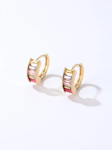 Detail of gold-plated hoop earrings with multi-colored baguette-cut cubic zirconia stones