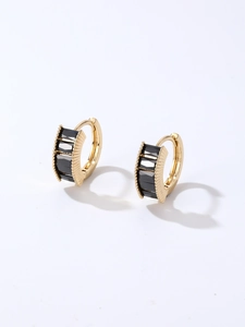 Detailed side view of gold-plated geometric earrings with rectangular black cubic zirconia