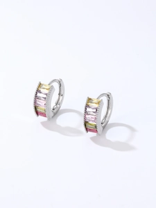 Detail of silver huggie earrings featuring four vertical rectangular multicolor zircon stones