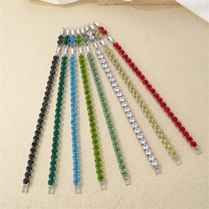 Detail view of multicolored tennis bracelets featuring high-quality round cut cubic zirconia