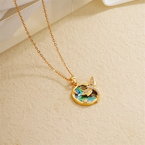 18K gold plated necklace featuring a dragonfly on an abalone shell heart pendant