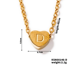 Close-up of gold heart pendant with letter D showing dimensions and 45cm chain length