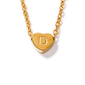 Minimalist gold heart necklace featuring a mirror finish and engraved letter D pendant