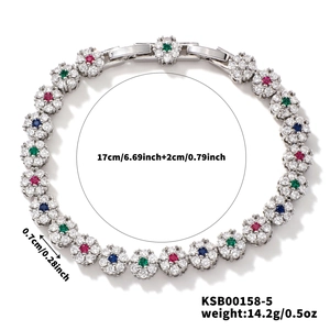 Pulsera de flores plateada con circonitas de colores y cadena de extensión ajustable