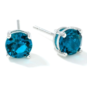 Minimalistische ronde blauwe glazen oorknopjes met vierpootzetting in gepolijst zilver