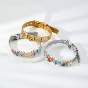 Adjustable metal mesh bracelet with heart and star charms featuring colored zircons