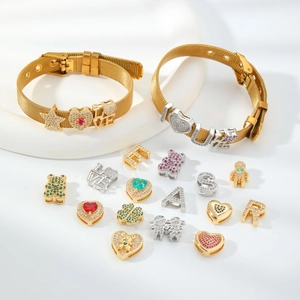 Golden mesh bracelet with adjustable buckle and assorted sparkling crystal charms