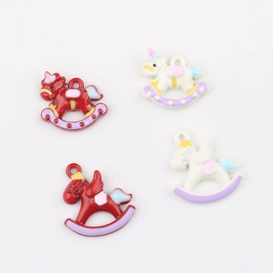 Set of four alloy rocking horse charms with enamel finish for DIY jewelry crafting