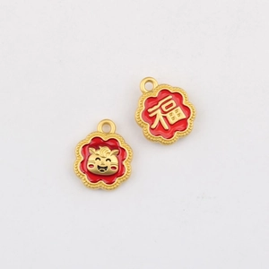 Detail of red floral charms with Fu character and tiger for DIY jewelry making