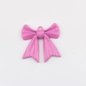 Detalle de colgante de lazo rosa en aleación con acabado esmaltado para joyería DIY