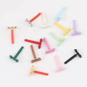 Detailed top view of colorful alloy bow-knot earring components for DIY jewelry making