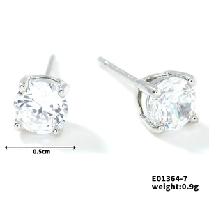 Minimalist 0.5cm round clear glass stud earrings with four-prong silver metal setting