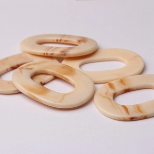 Oval cream resin marble charms for DIY jewelry making and handmade accessory design