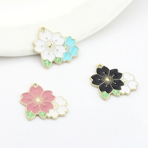 Dual-color enamel cherry blossom charms in alloy gold plating for DIY jewelry making