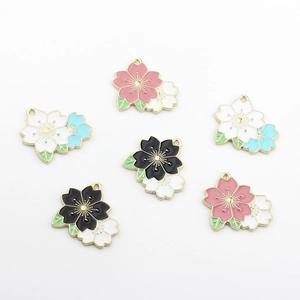 Set of six colorful enamel cherry blossom charms with gold metal edges for DIY jewelry