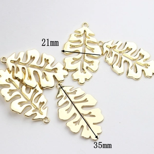 Pendentifs feuilles dorées ajourées 21x35mm en alliage pour création bijoux DIY