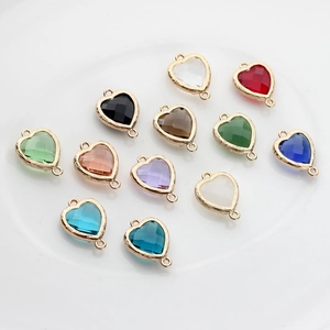 Set of 12 multi-colored heart-shaped faceted crystal charms with gold-plated metal frames
