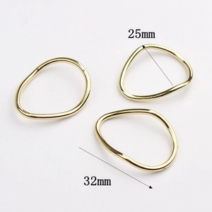 Detailed size comparison of 25mm and 32mm wavy irregular golden zinc alloy rings