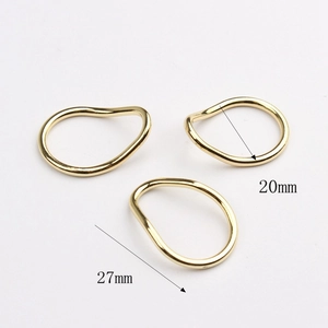 Detailed view of 20x27mm gold zinc alloy irregular geometric hollow pendants for DIY