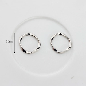 Detail of 15mm silver wavy irregular metal ring pendants for DIY earring jewelry making