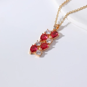 Elegant gold necklace with multi-row pear-shaped red zircons and white round stones