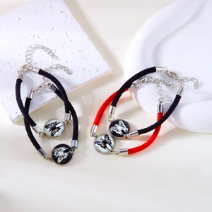 Adjustable butterfly braided couple bracelets with sun and moon theme in black and red cord
