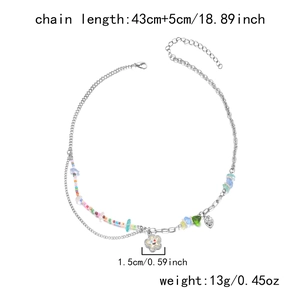 Detailed view of 43cm double-layer chain with colorful beads and white flower smile charm