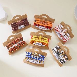 7-piece sports theme clay bead bracelet set featuring soccer basketball and baseball motifs