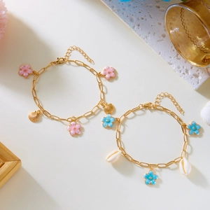 Bohemian gold ankle bracelets with pink enamel flowers and natural seashells set