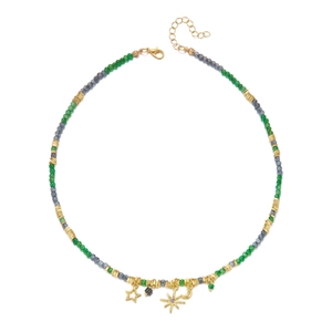 Detailed view of beaded necklace with gold star moon pendants and lobster clasp
