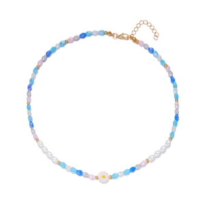 Double-layered beaded necklace featuring blue rhinestones and a white flower pendant