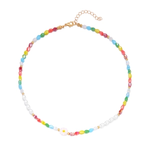 Close-up of a colorful beaded necklace with faceted gems and a white daisy pendant
