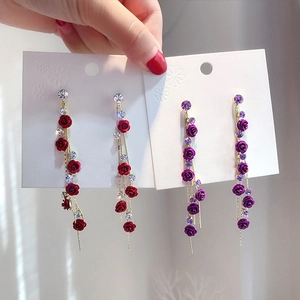 Elegant long tassel earrings featuring red and purple roses with sparkling rhinestones