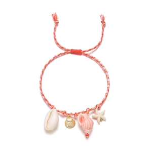 Close-up of woven rope bracelet with natural cowrie shell and starfish charms