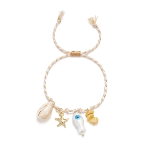 Detail of woven ocean bracelet with starfish, seashell charms and evil eye beads