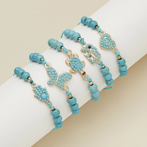 Set di 5 braccialetti con perline turchesi e ciondoli dorati Hamsa, tartaruga ed elefante
