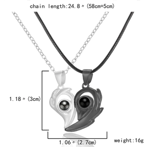 Detailed view of magnetic heart necklaces with 100 languages I love you projection stone