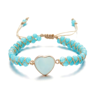 Pulsera tejida a mano con corazón azul claro, cordón ajustable y montura de oro rosa