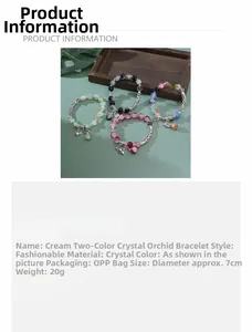 Detailed view of lily of the valley crystal bracelet with cream dual-tone flower charms