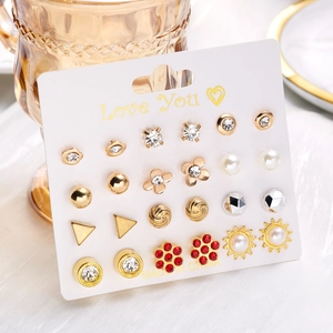 12-pair earring set on display card featuring floral, heart, and crystal stud designs