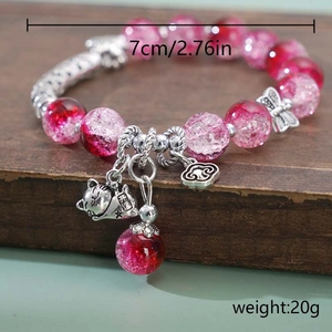 Pink Lily of the Valley crystal beaded bracelet with lucky cat charm and floral pendants